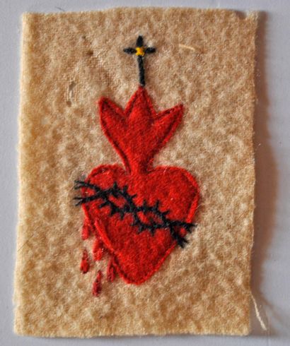 Sacré cœur en tissu, symbole des combattants...